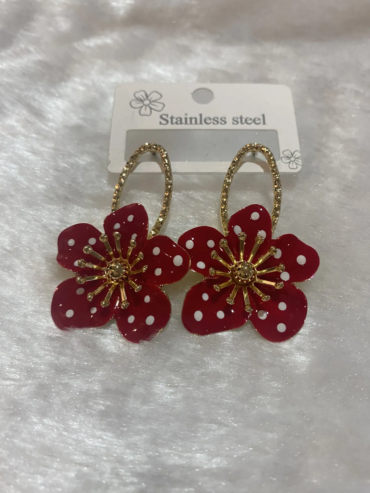 Aretes de acero inoxidable dorado 